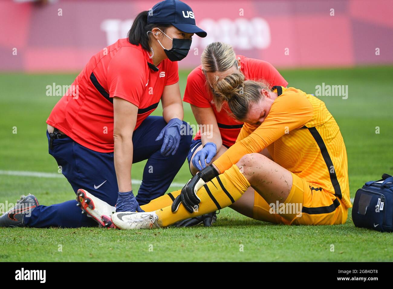Ibaraki Japan 2nd Aug 21 Alyssa Naeher 1st R Goalkeeper Of The United States Receives Treatment After Injury During The Women S Football Semifinal Match Between The United States And Canada At Tokyo Ibaraki Japan 2nd Aug 21 Alyssa Naeher 1st R Goalkeeper Of The United States Receives Treatment After Injury During The Women S Football Semifinal Match Between The United States And Canada At Tokyo