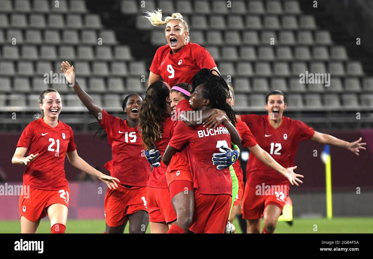 Kashima, Japan. 02nd Aug, 2021. Canada's players join on the field to