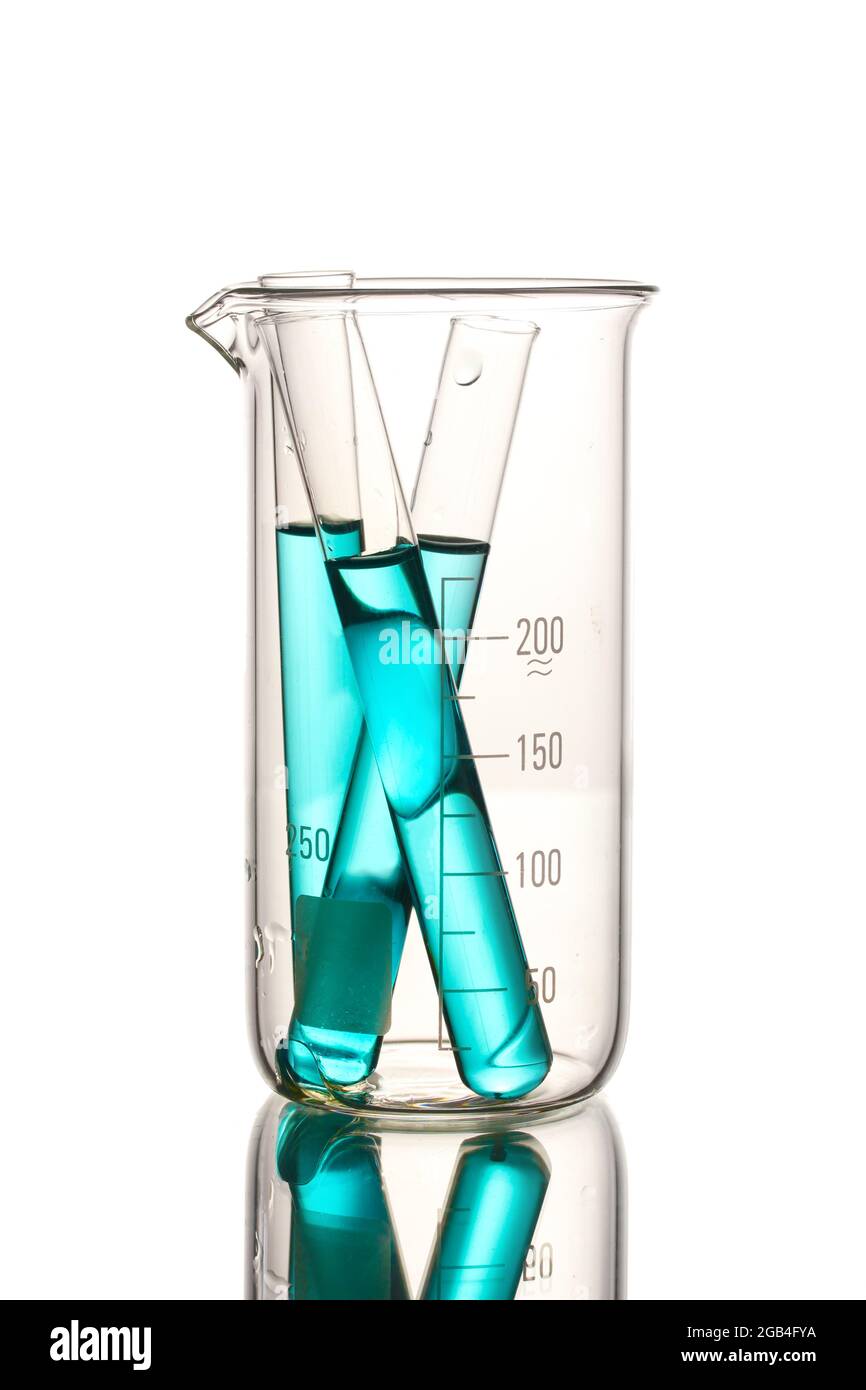 Laboratory tubes with blue liquid in measuring beaker with reflection