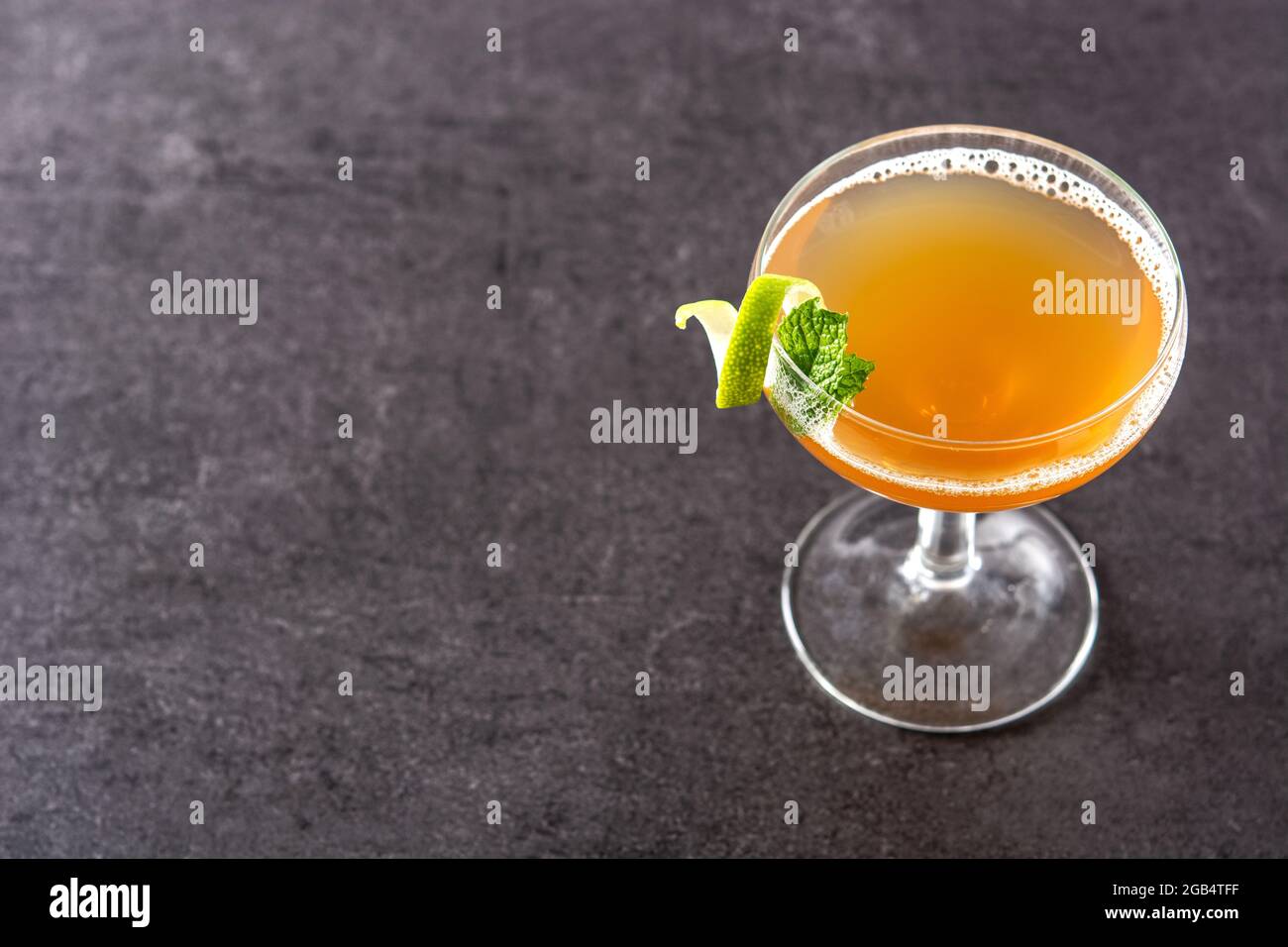 Old Cuban cocktail on black slate background Stock Photo - Alamy