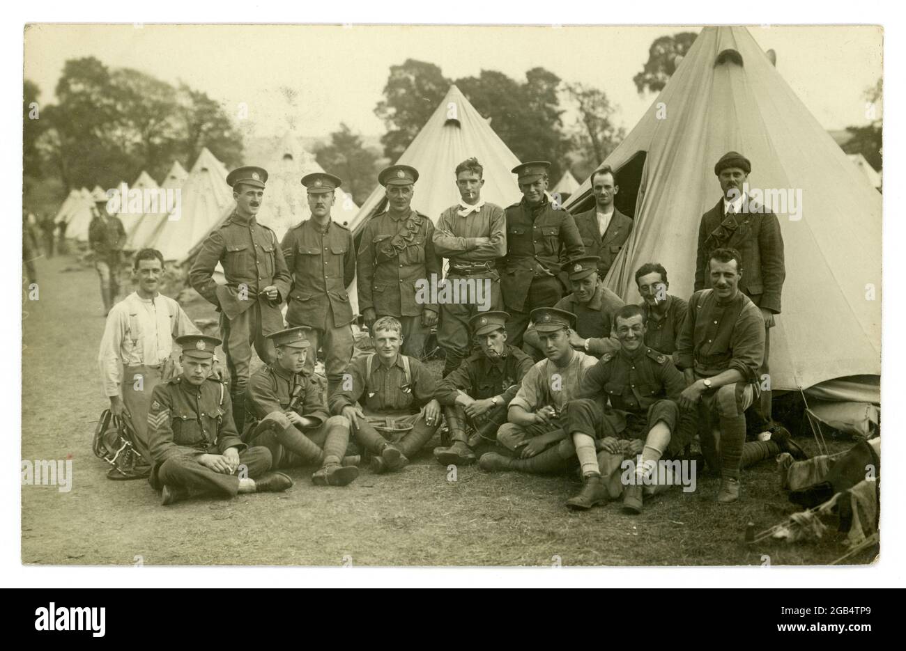 WW1 era postcard of young men possibly of the elite Territorial Westminster Dragoons or 2nd County of London Yeomanry (a cavalry regiment) posted 6 October 1914, a few months after the call for mobilisation came - at their summer camp at Goring-on-Thames, South Oxfordshire, U.K. Stock Photo
