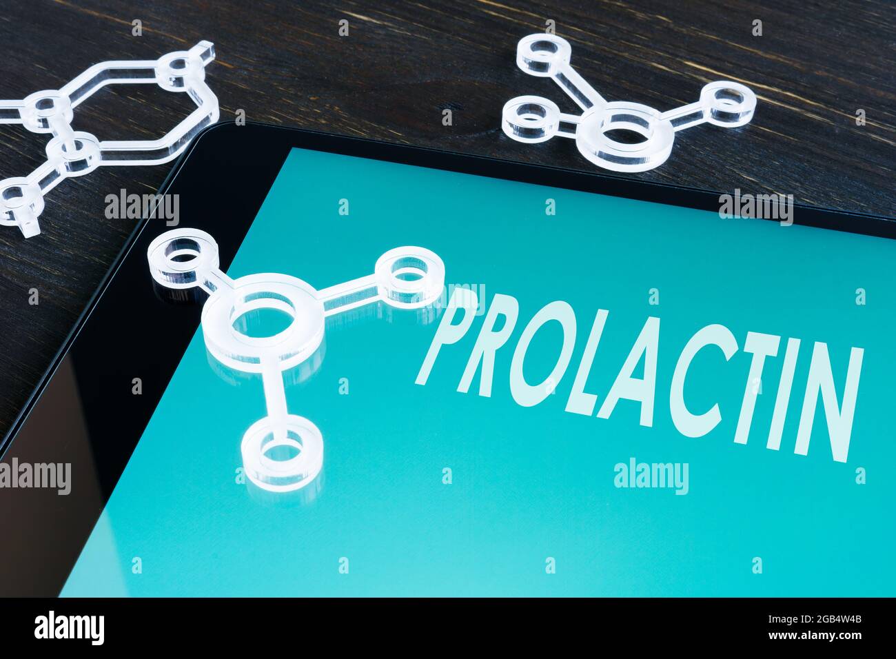 Prolactin hormone PRL word on the screen and moleculas. Stock Photo