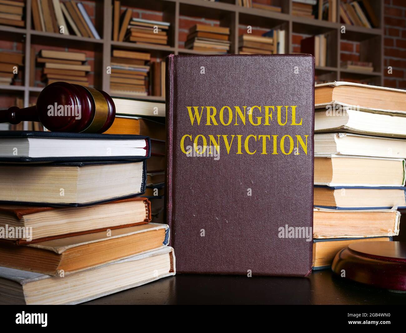 The book about Wrongful conviction and gavel. Stock Photo