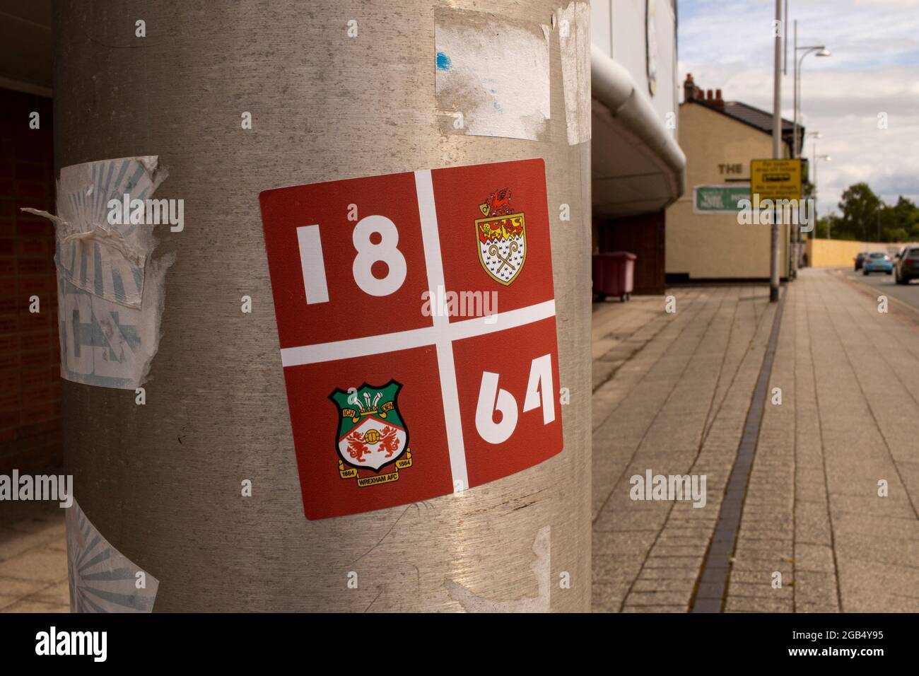 A sticker outside Wrexham FC's Racecourse ground on the 29th July 2021. Credit: Lewis Mitchell Stock Photo