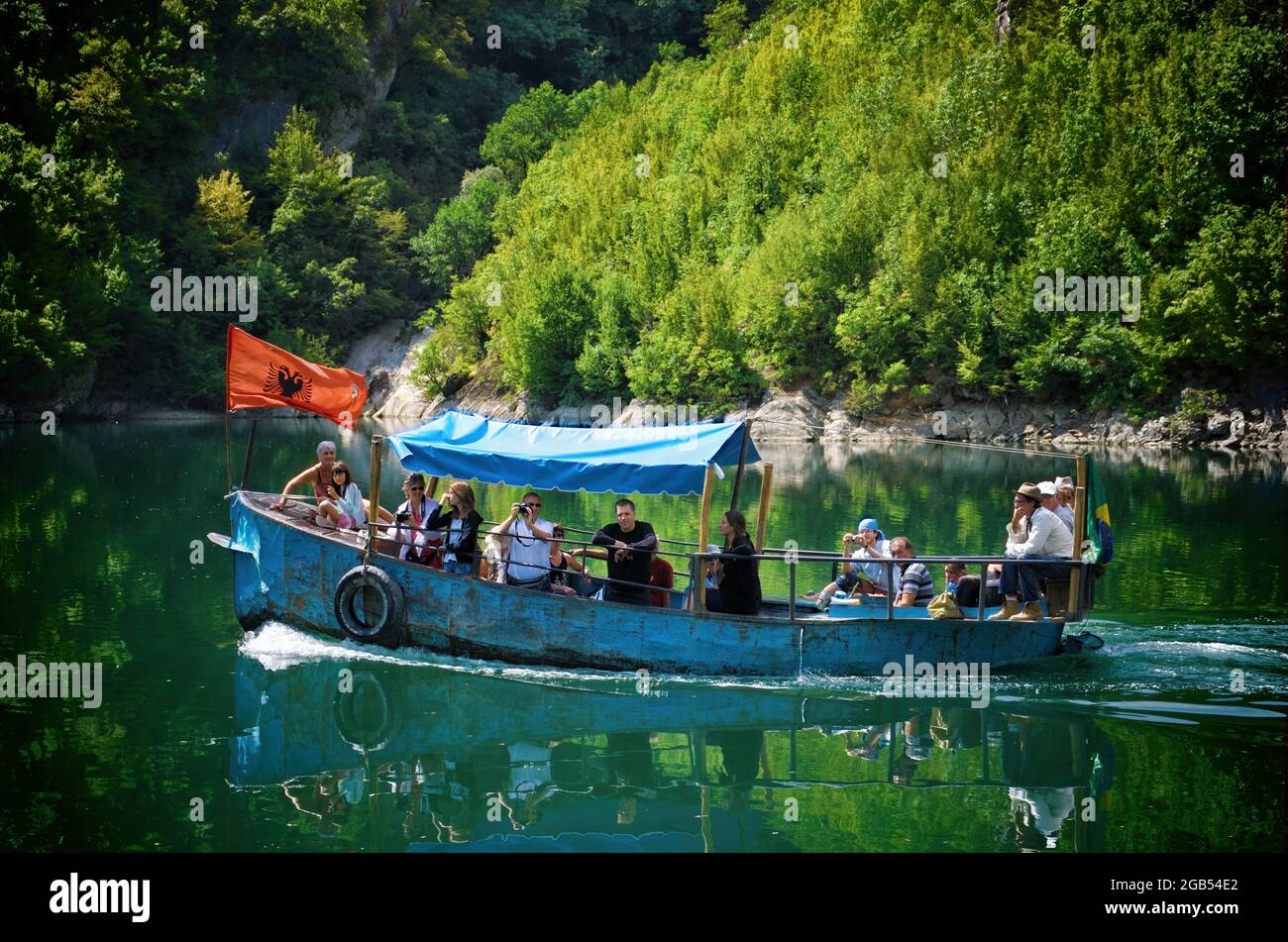 nature of Albania and outdoor tourism old tourist ferry boat on Koman Lake Stock Photo