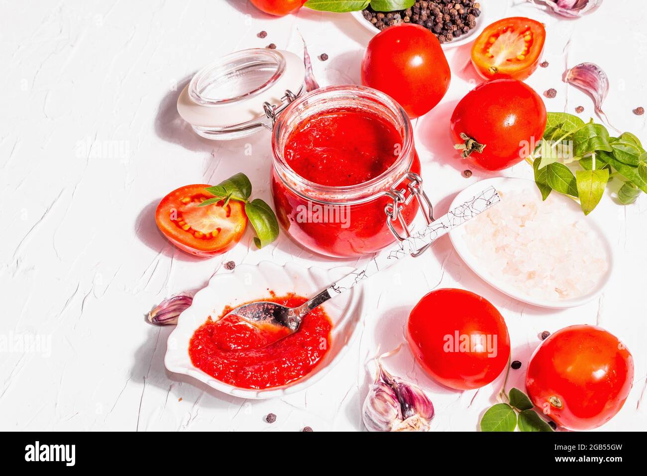 Tomato confiture, jam, chutney, sauce in a glass jar. Homemade