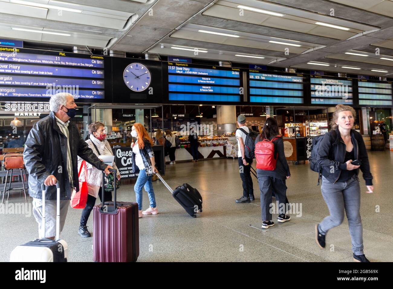 London, UK. 02nd Aug, 2021. London, United Kingdom, August 2, 2021. Travellers walk on the platforms at London Saint Pankras Station as Coronavirus restrictions ease for fully vaccinated travelers coming to England. Credit: Dominika Zarzycka/Alamy Live News Stock Photo