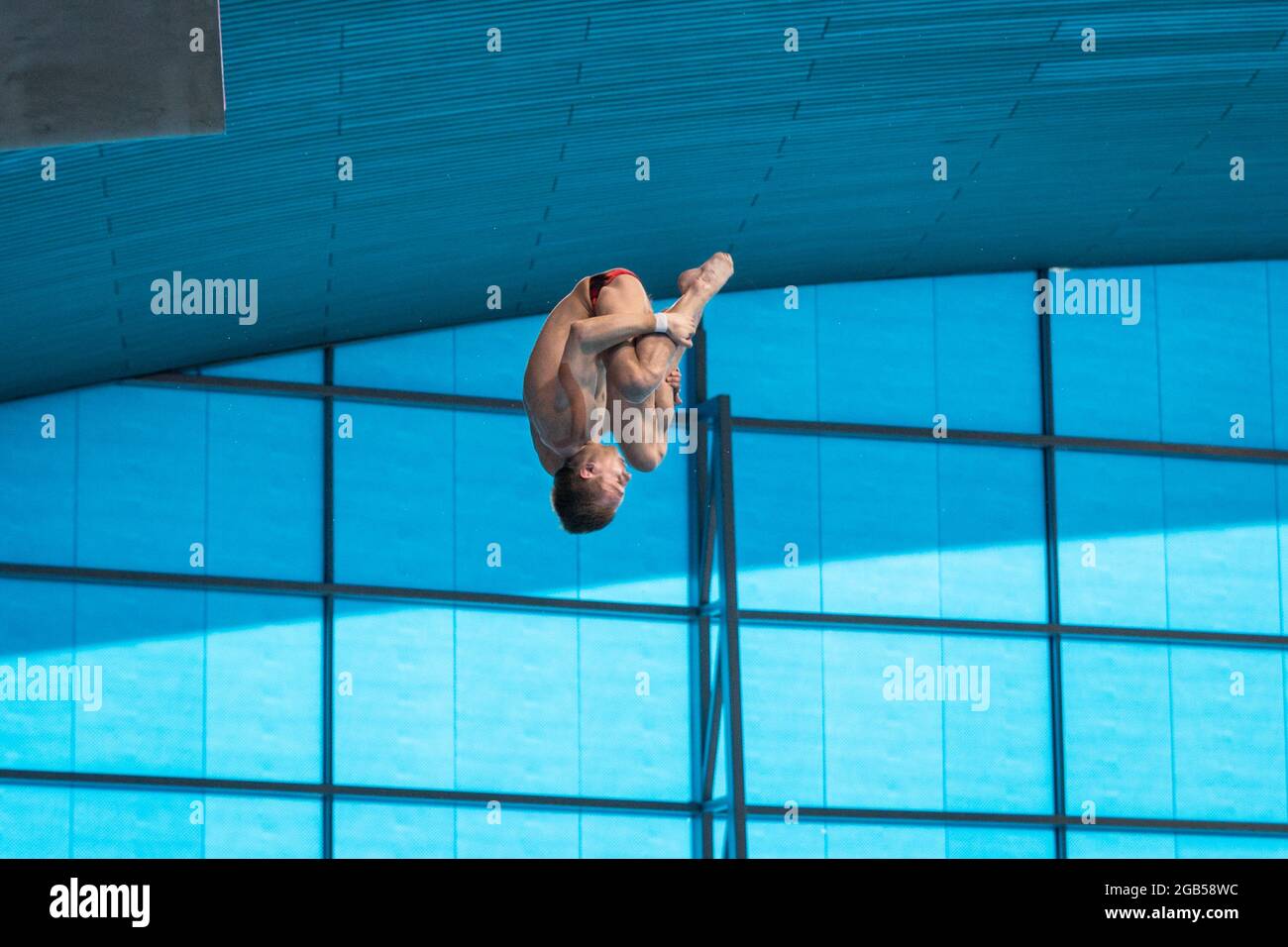 Russian diver Viktor Minibaev, tuck,  diving from the 10 m platform at the European Diving Championships 2016, London, UK Stock Photo