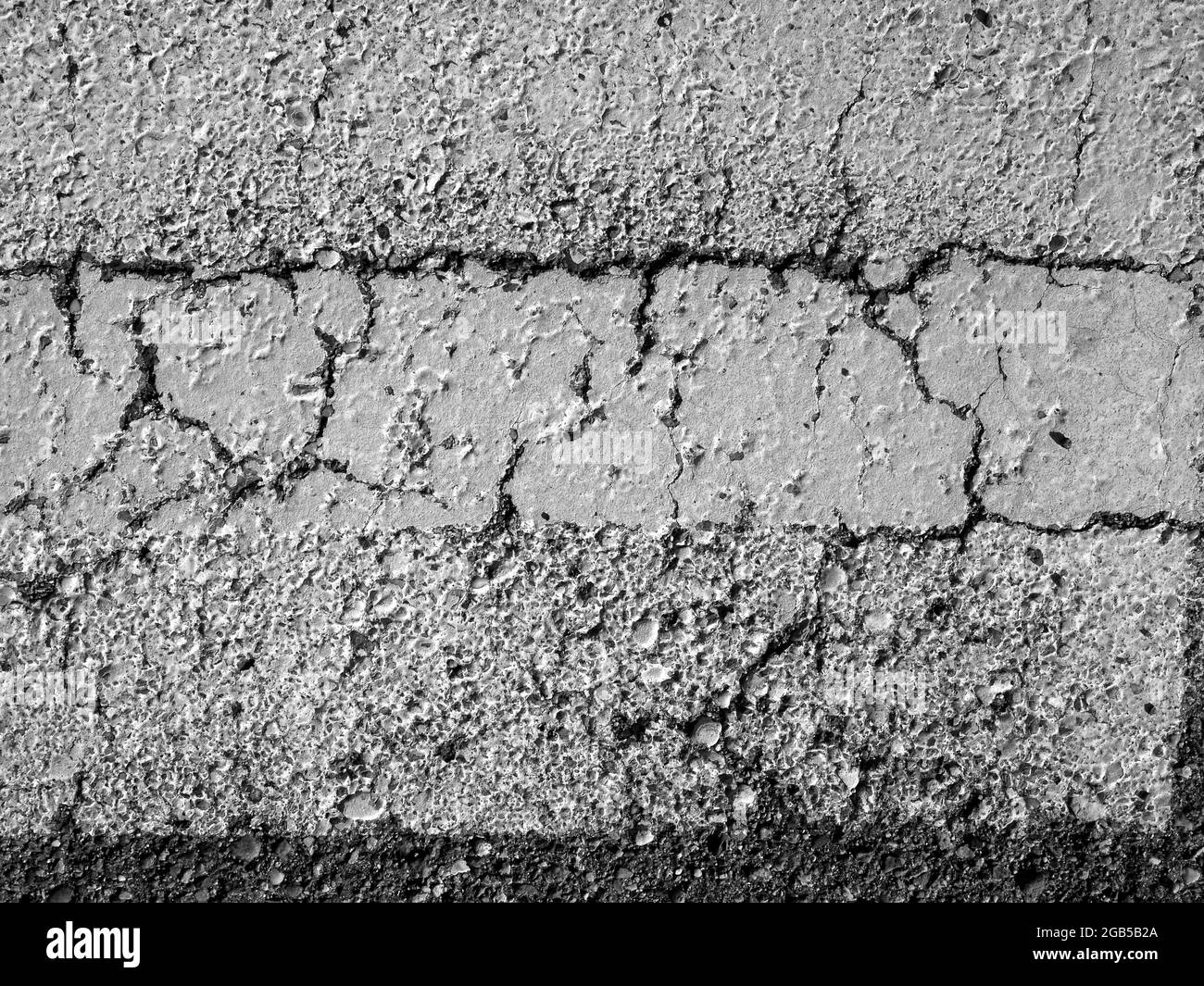Cracks in the concrete textured background image Stock Photo