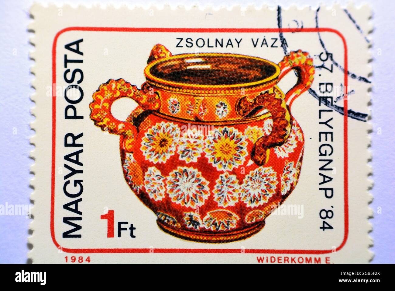 A postage stamp printed in the Hungary shows Four-handled vase, Zsolnay, circa 1984, Old Stamp shows a Vase from Zsolnay porcelain factory , red 1984, Stock Photo