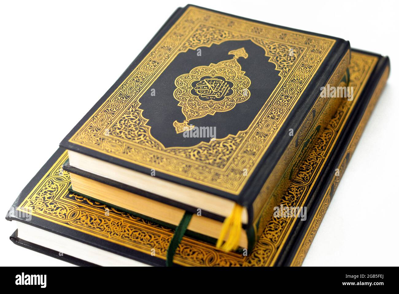 The holy Quran, Qur'an or Koran (the recitation) is the central religious text of Islam, believed by Muslims to be a revelation from God (Allah) Stock Photo