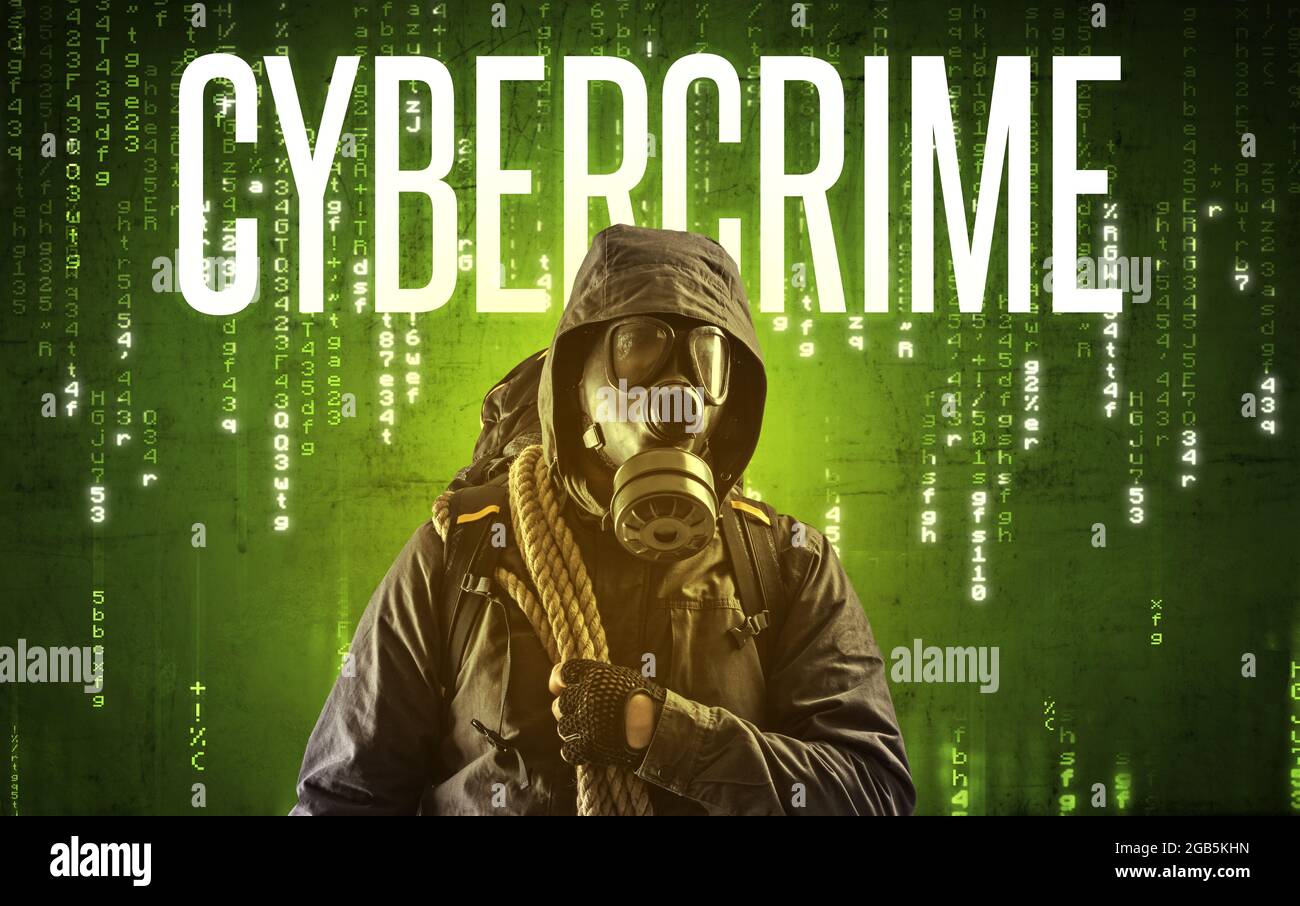 Faceless hacker with inscription Stock Photo