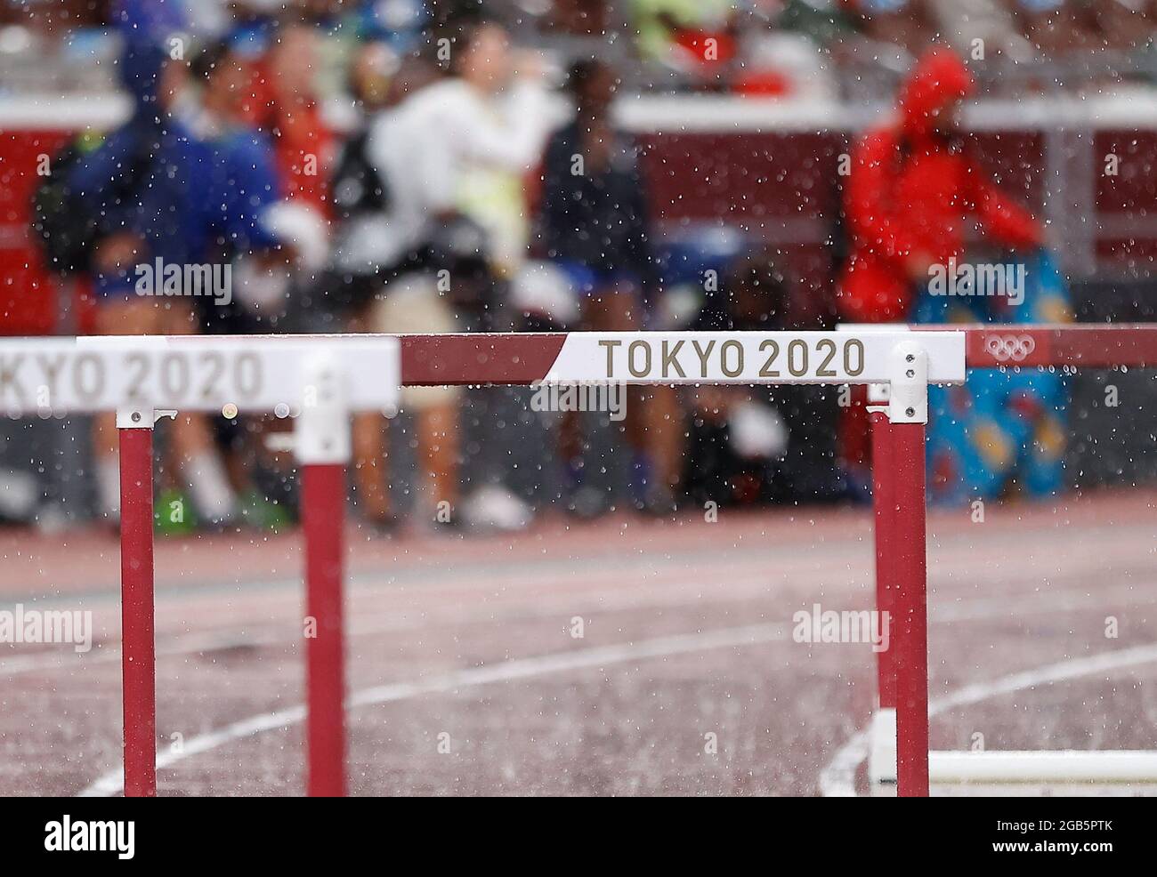 Tokyo, Japan. 2nd Aug, 2021. Athletes wait as the women's discus throw final is interrupted by the rain at Tokyo 2020 Olympic Games, in Tokyo, Japan, Aug. 2, 2021. Credit: Wang Lili/Xinhua/Alamy Live News Stock Photo