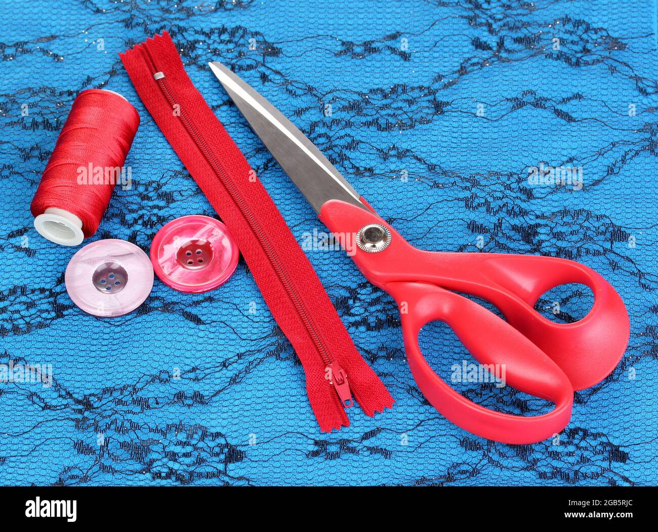 Sewing accessories on fabric Stock Photo Alamy