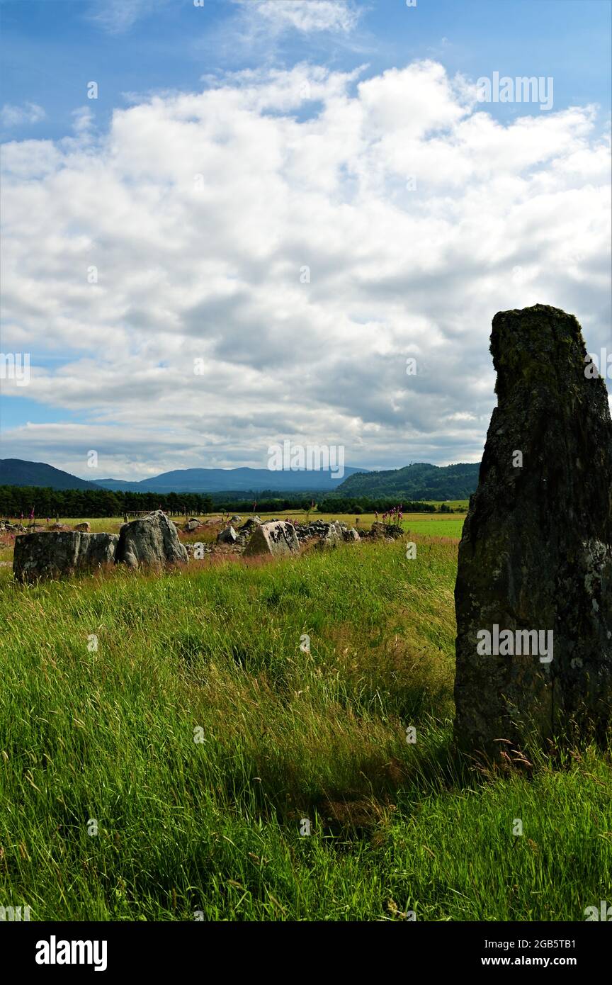 A view of a Neolithic stone circle from the bronze age in a field in Alvie near Aviemore in the Scottish highlands. Stock Photo