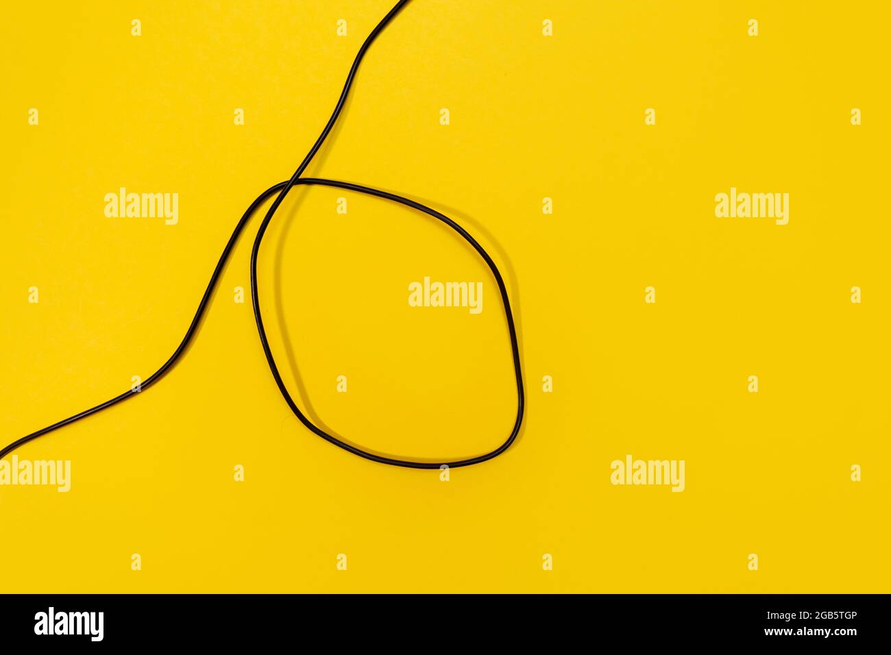 USB wires on a yellow background Stock Photo