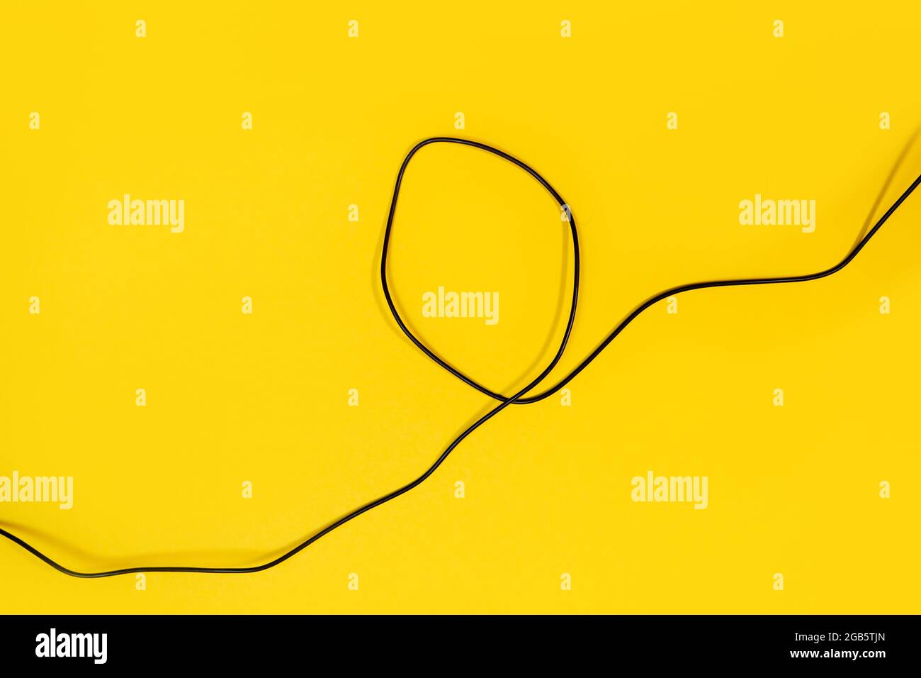 USB wires on a yellow background Stock Photo