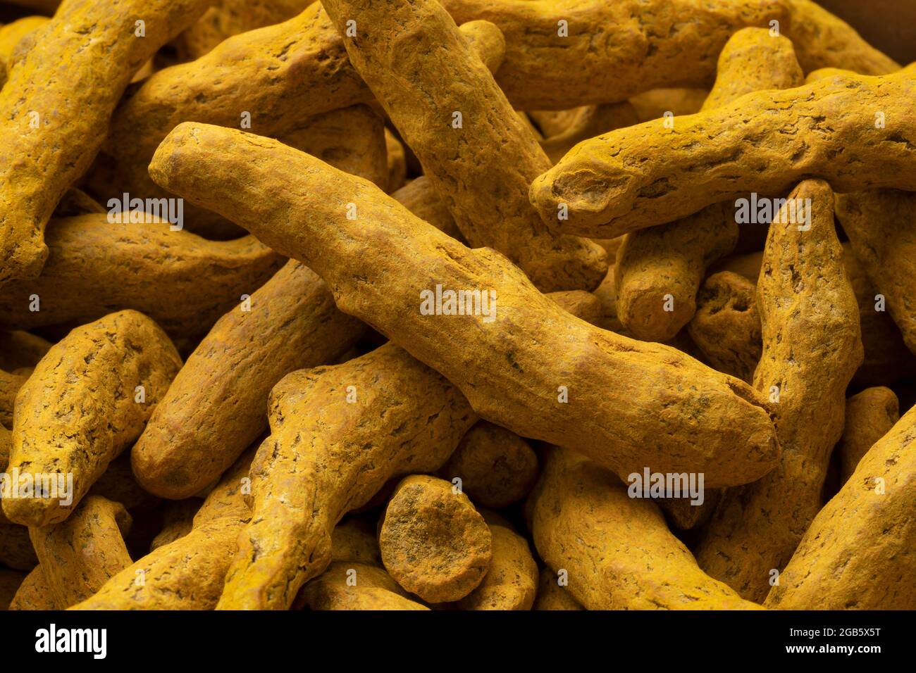 Dried yellowturmeric close up full frame as a background Stock Photo