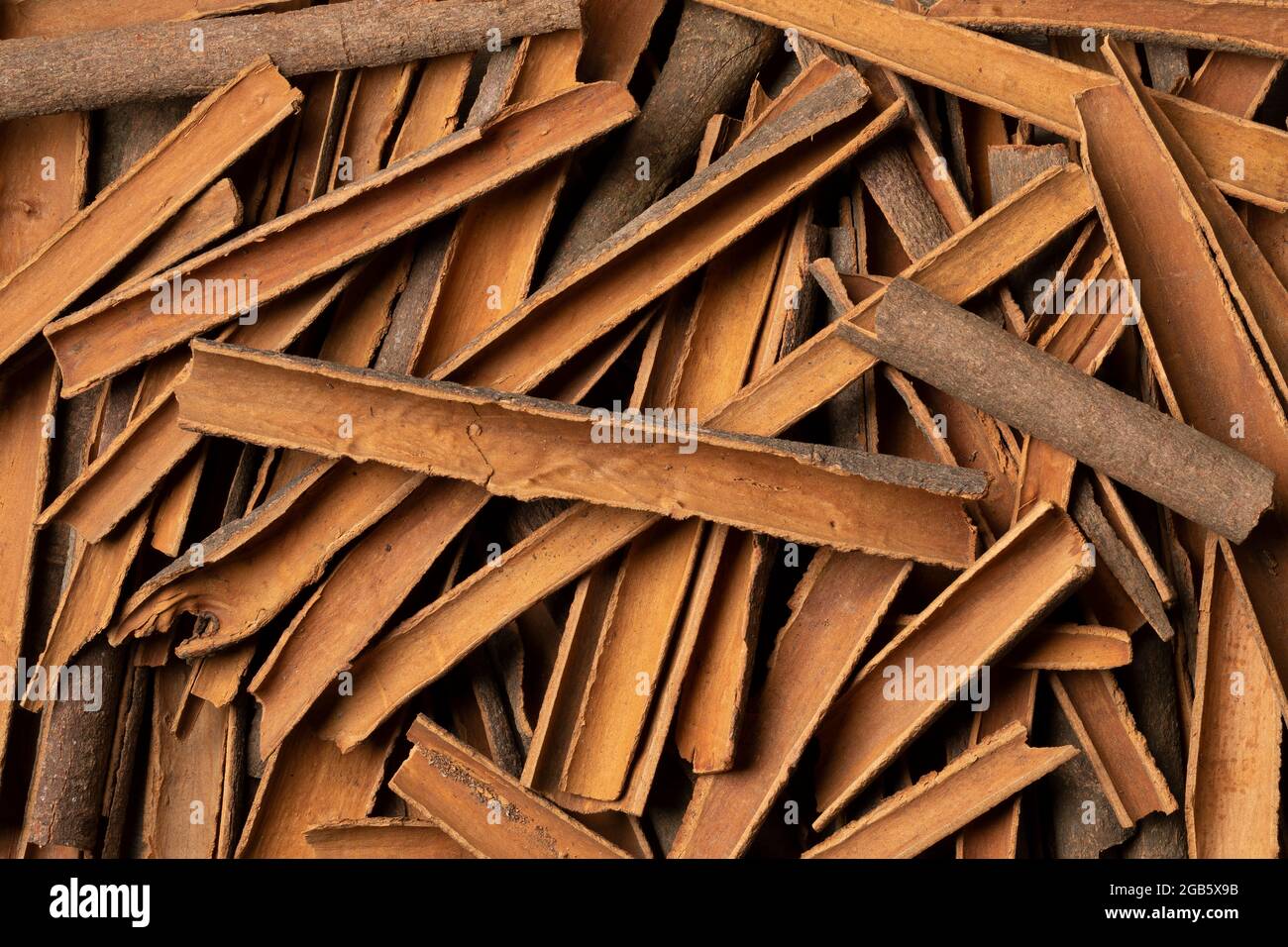 Dried Cinnamon bark close up full frame as a background Stock Photo