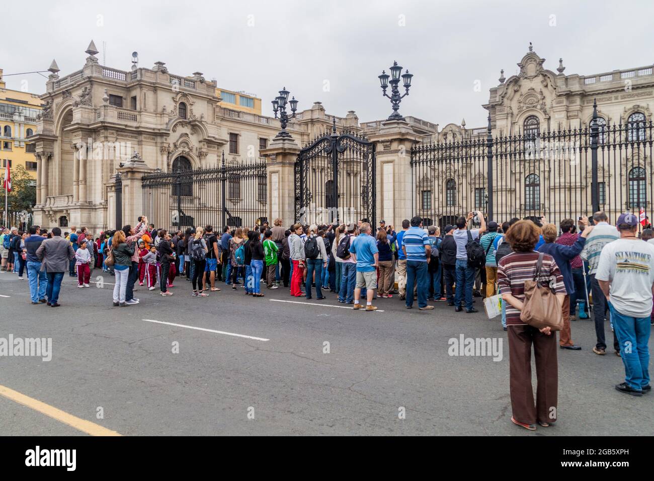 LIMA, PERU - JUNE 4, 2015: People watch changing the guards in front of Palacio de Gobierno (Government palace) in Lima, Peru. Stock Photo