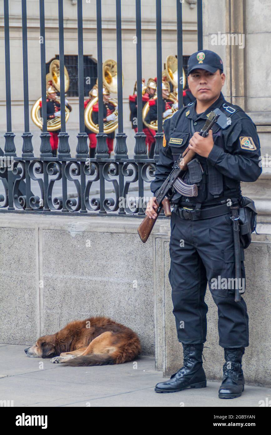 LIMA, PERU - JUNE 4, 2015: Armed guard at the gate of Palacio de Gobierno (Government palace) in Lima, Peru. Stock Photo