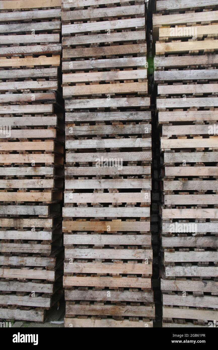 Pile or stack of wooden cargo pallets ready for shipping. Stock Photo