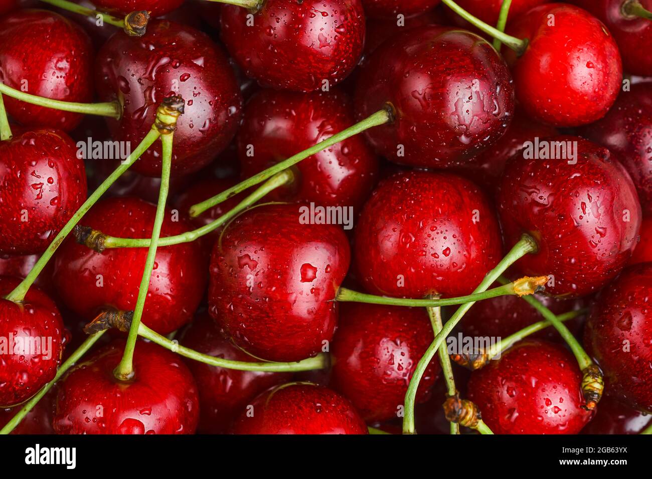 Close up background of fresh sweet cherries. Stock Photo