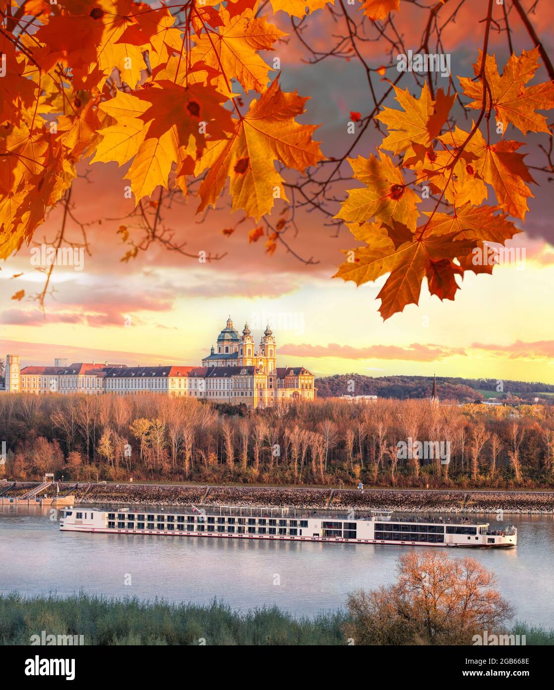 Panorama of Melk abbey with Danube river and autumn forest in Austria Stock Photo