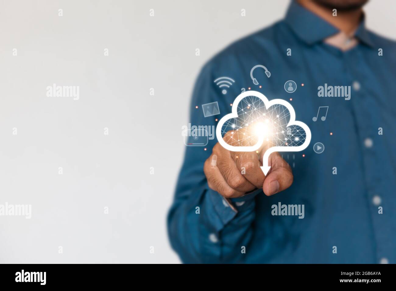 Businessman holding a cloud data icon with light. Computing data on network. Insurance Business computer security concept. Stock Photo
