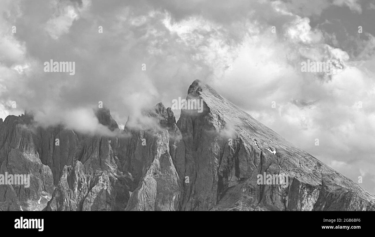 Mountain peaks under the sky with clouds clouds Dolomites Italy Stock ...