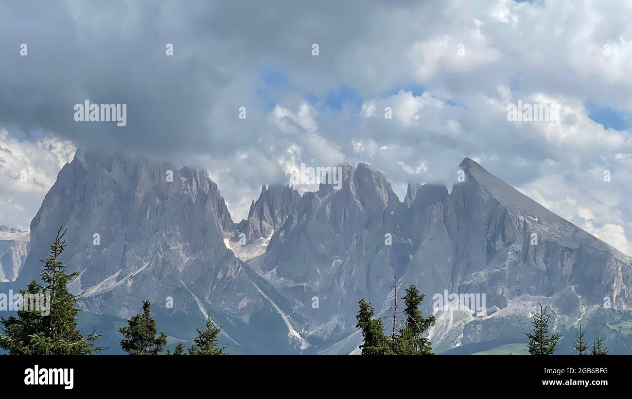 Mountain peaks under the sky with clouds clouds Dolomites Italy Stock ...