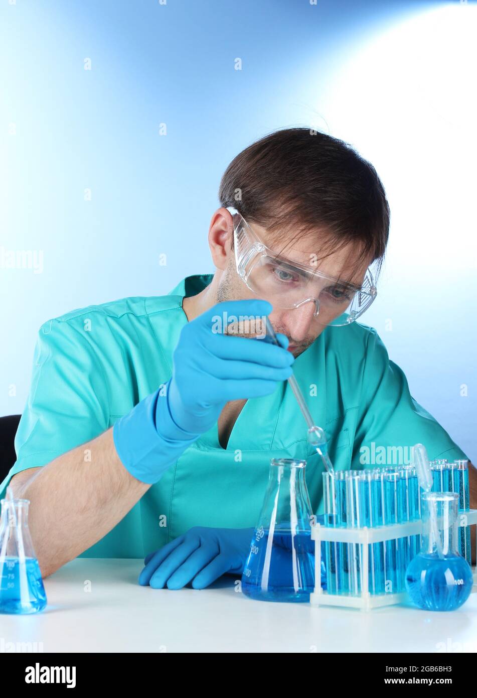 scientist in the lab working with chemicals testtubes Stock Photo Alamy