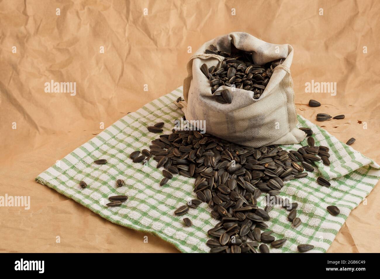 pouch with sunflower seeds on paper background Stock Photo Alamy