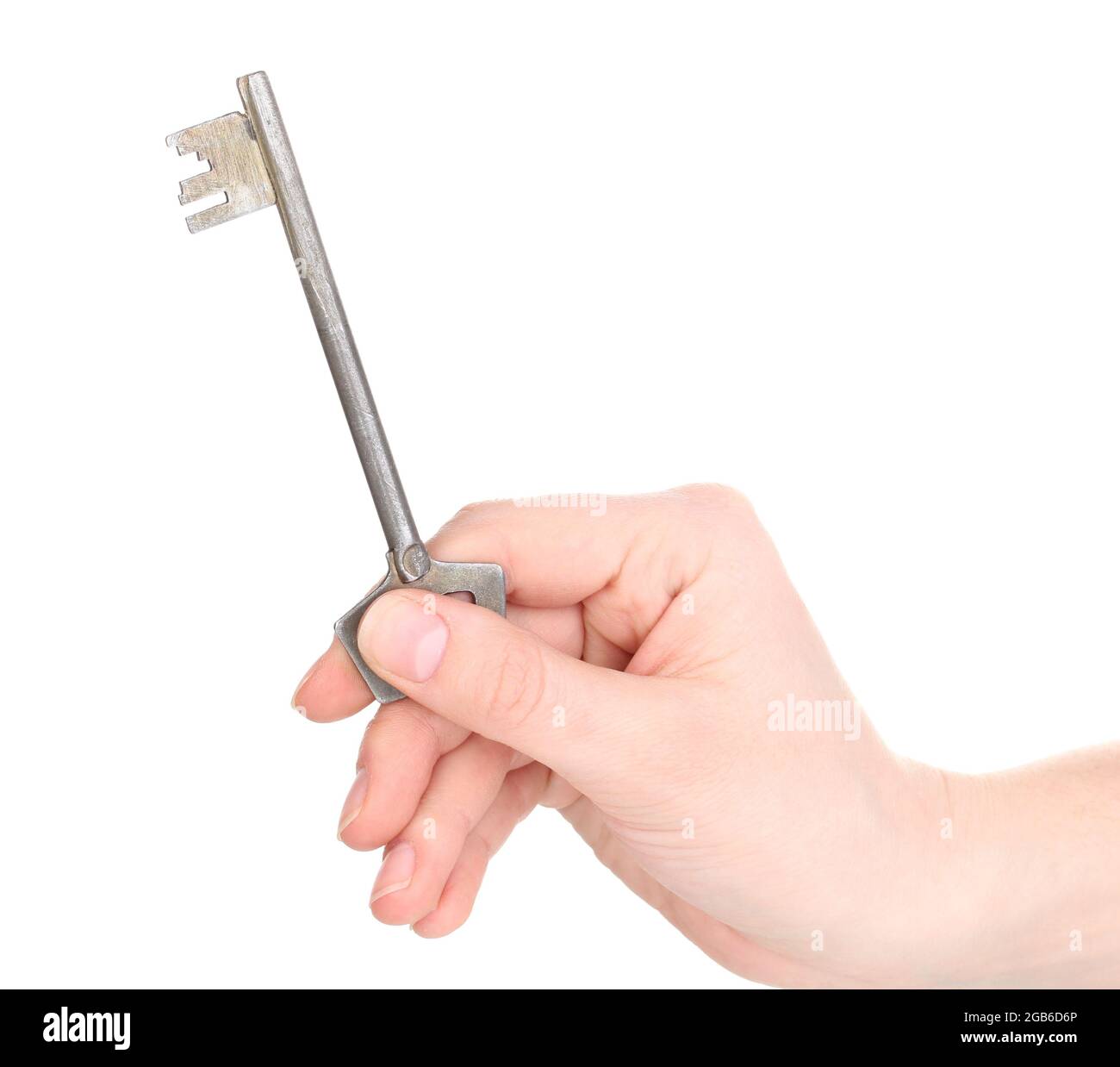 Key in hand isolated on white Stock Photo - Alamy