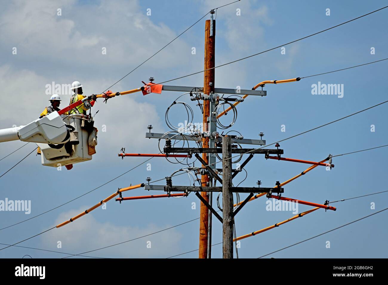 Power Utility Using Ropes As part of improving the infrastructure of the local electrical grid a ...