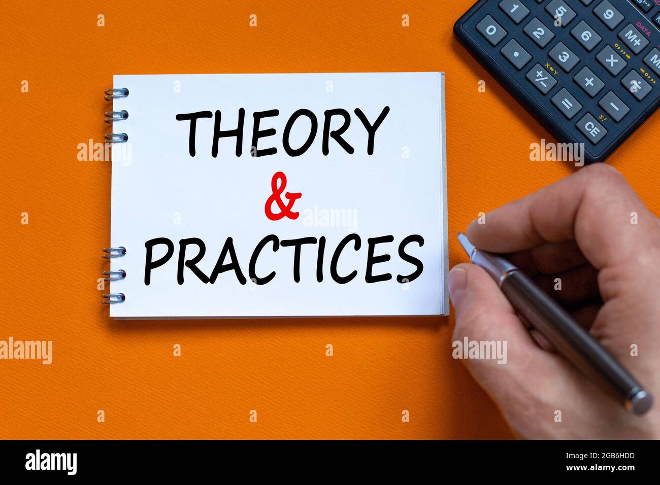 Theory and practice symbol. Businessman writing words 'Theory and ...