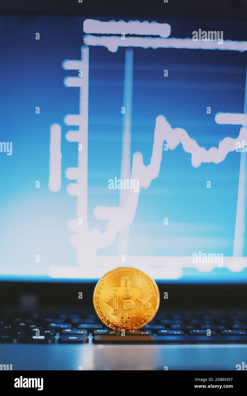 Bitcoin Computer Size bitcoin on computer keyboard and growth chart Stock Photo - Alamy
