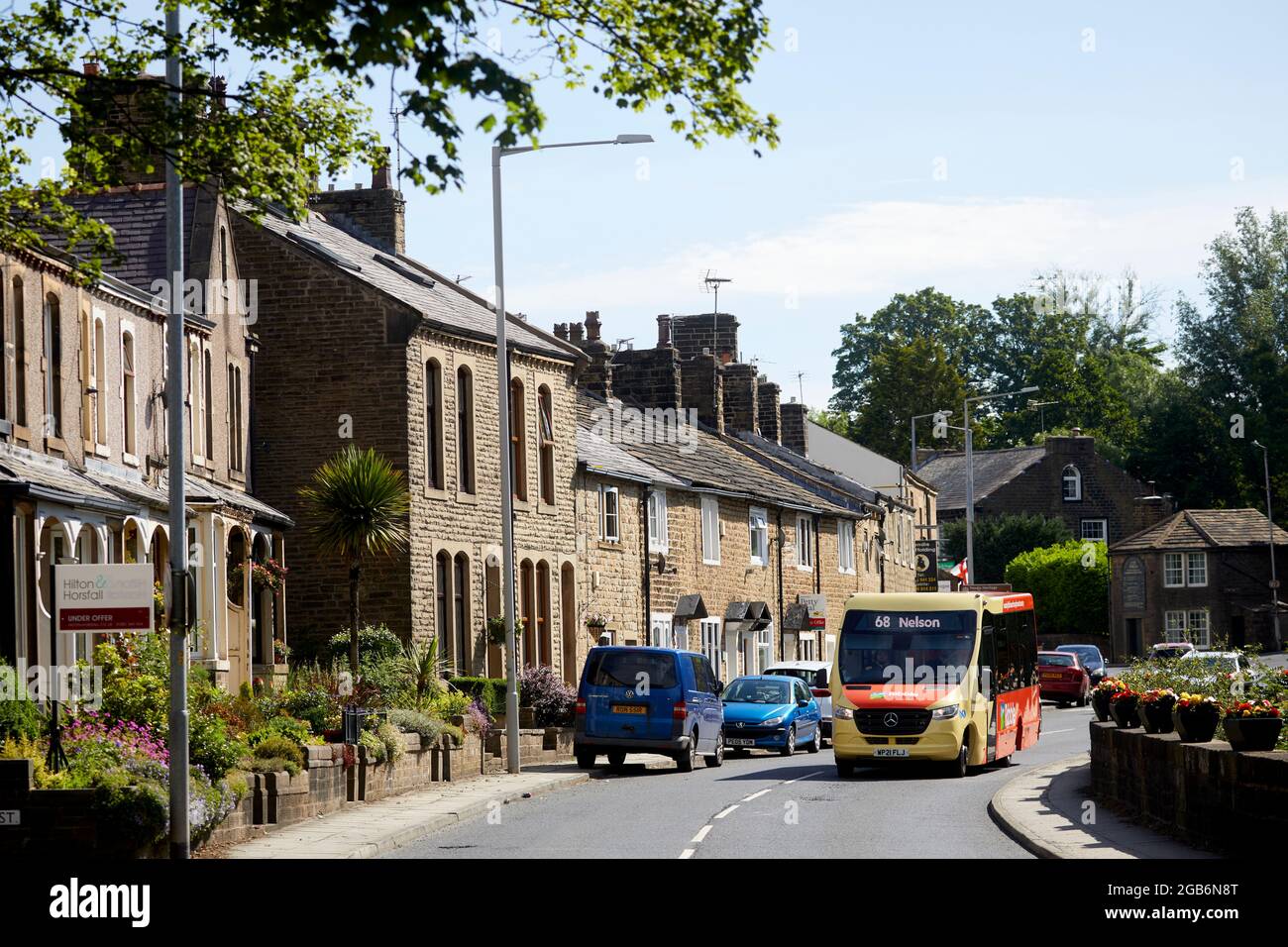 Barrowford village civil parish Pendle district of Lancashire, England. Table of Tolls on Gibson Road and a Ribble Country bus Stock Photo