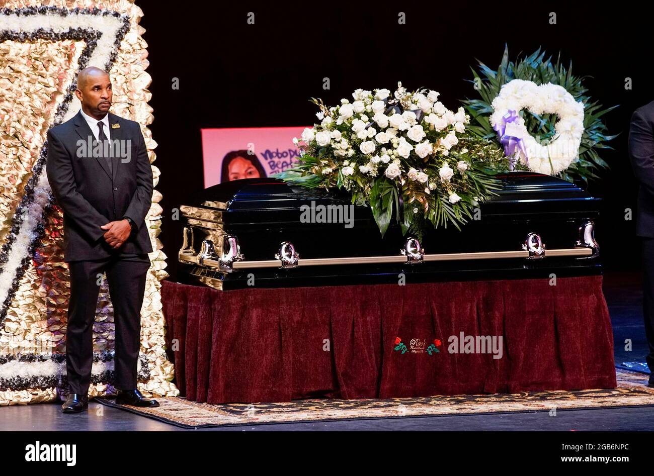 A man stands guard next to the casket for late rapper Marcel Theo Hall,  known by his stage name Biz Markie, during the funeral service in  Patchogue, New York, U.S., August 2,