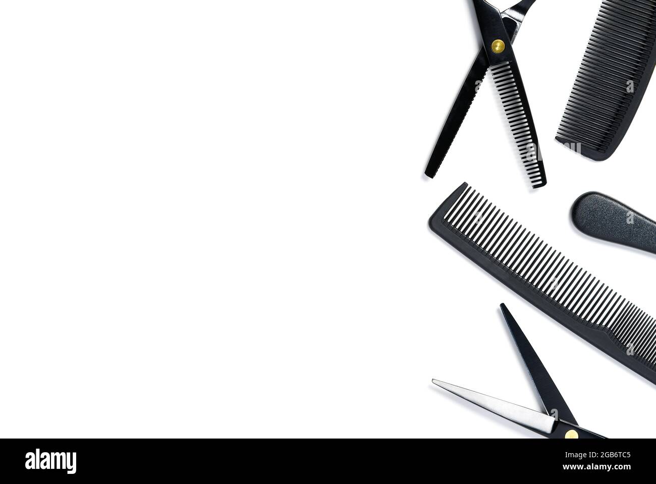 layout on white from scissors and combs for hairdressing services Stock Photo