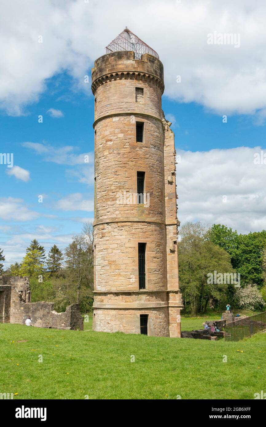 The tower and part of the ruined walls of the late 18th century former   Eglinton Castle, now part of Eglinton Country Park in Kilwinning, N. Ayrshire. Stock Photo