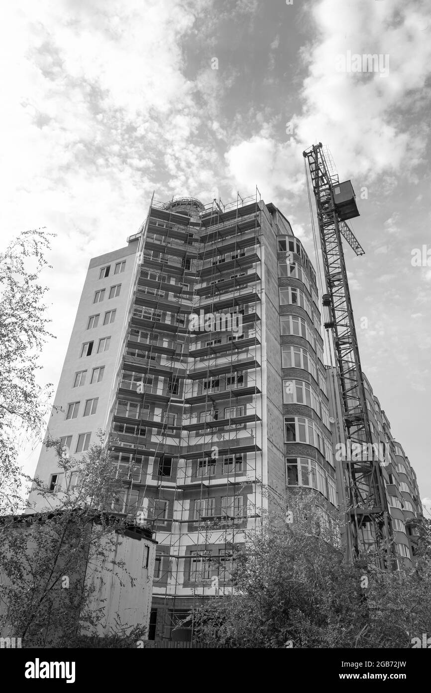 Black and white photo of a multi-storey residential building under ...