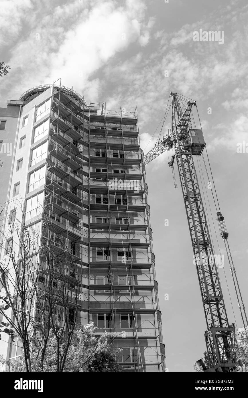 Black and white photo of a multi-storey residential building under ...