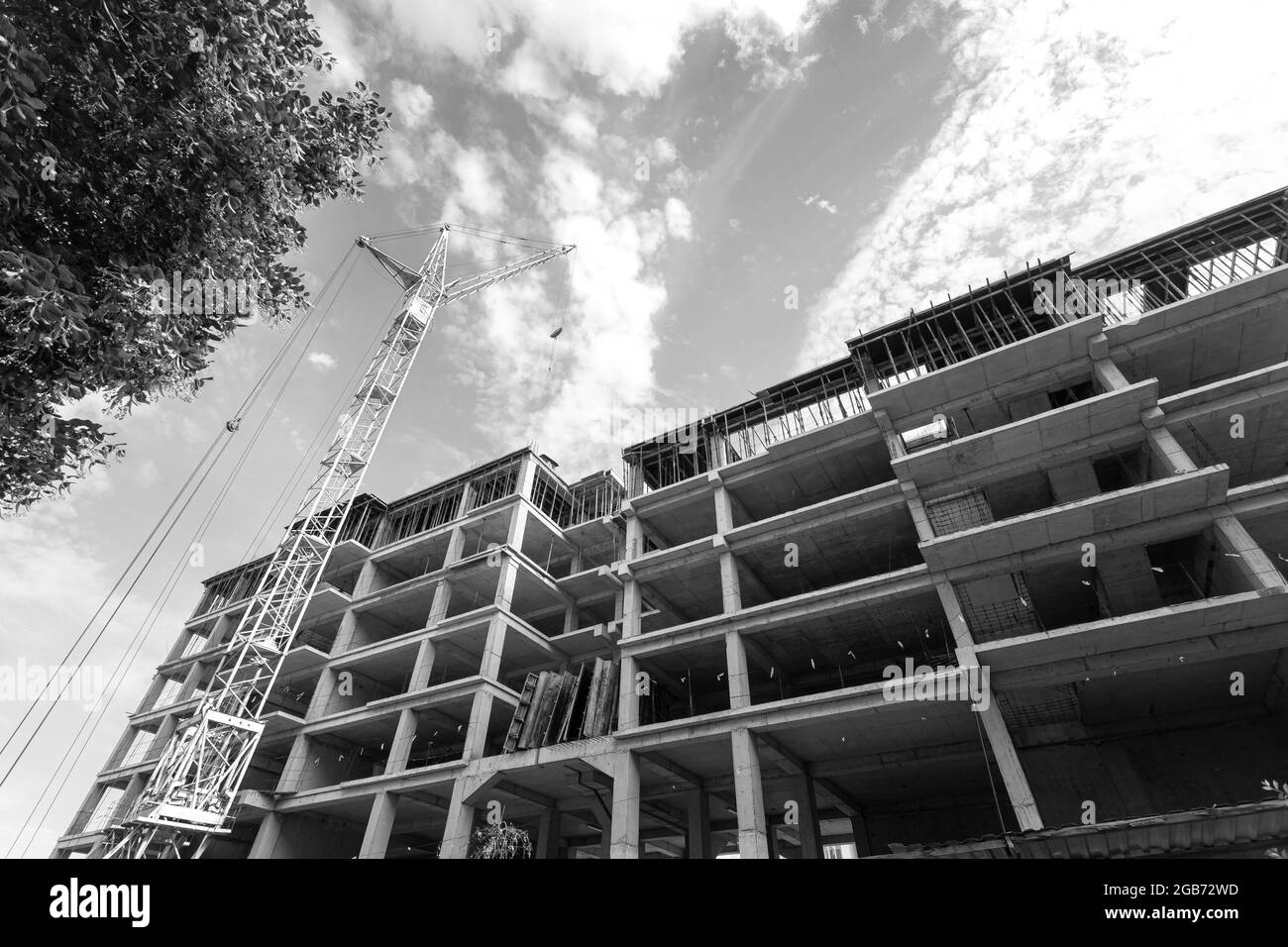 Black and white photo of a multi-storey residential building under ...