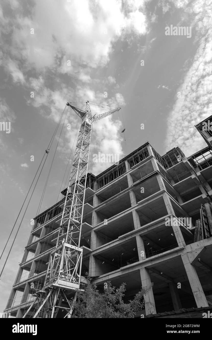 Black and white photo of a multi-storey residential building under ...