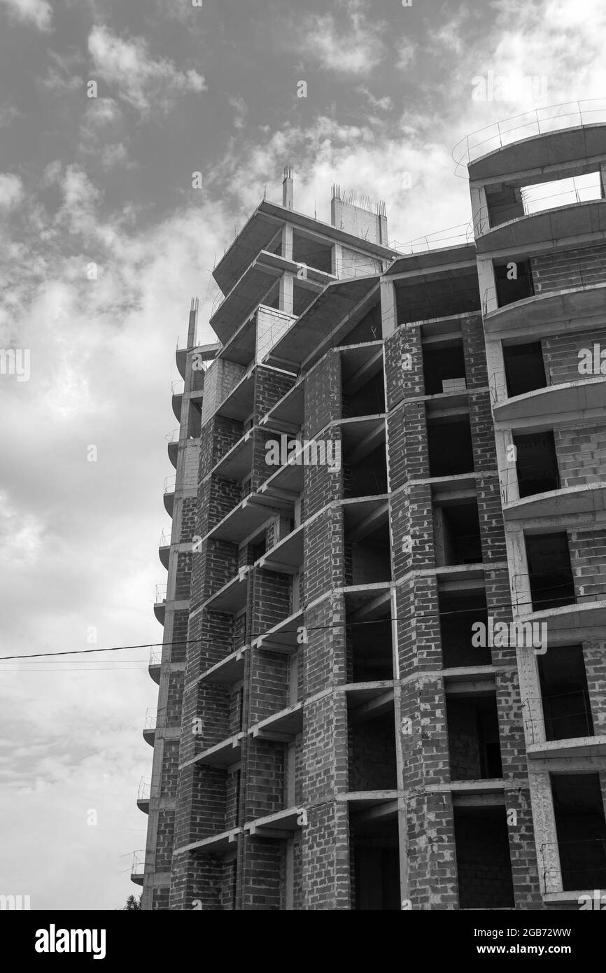 Black and white photo of a multi-storey residential building under ...