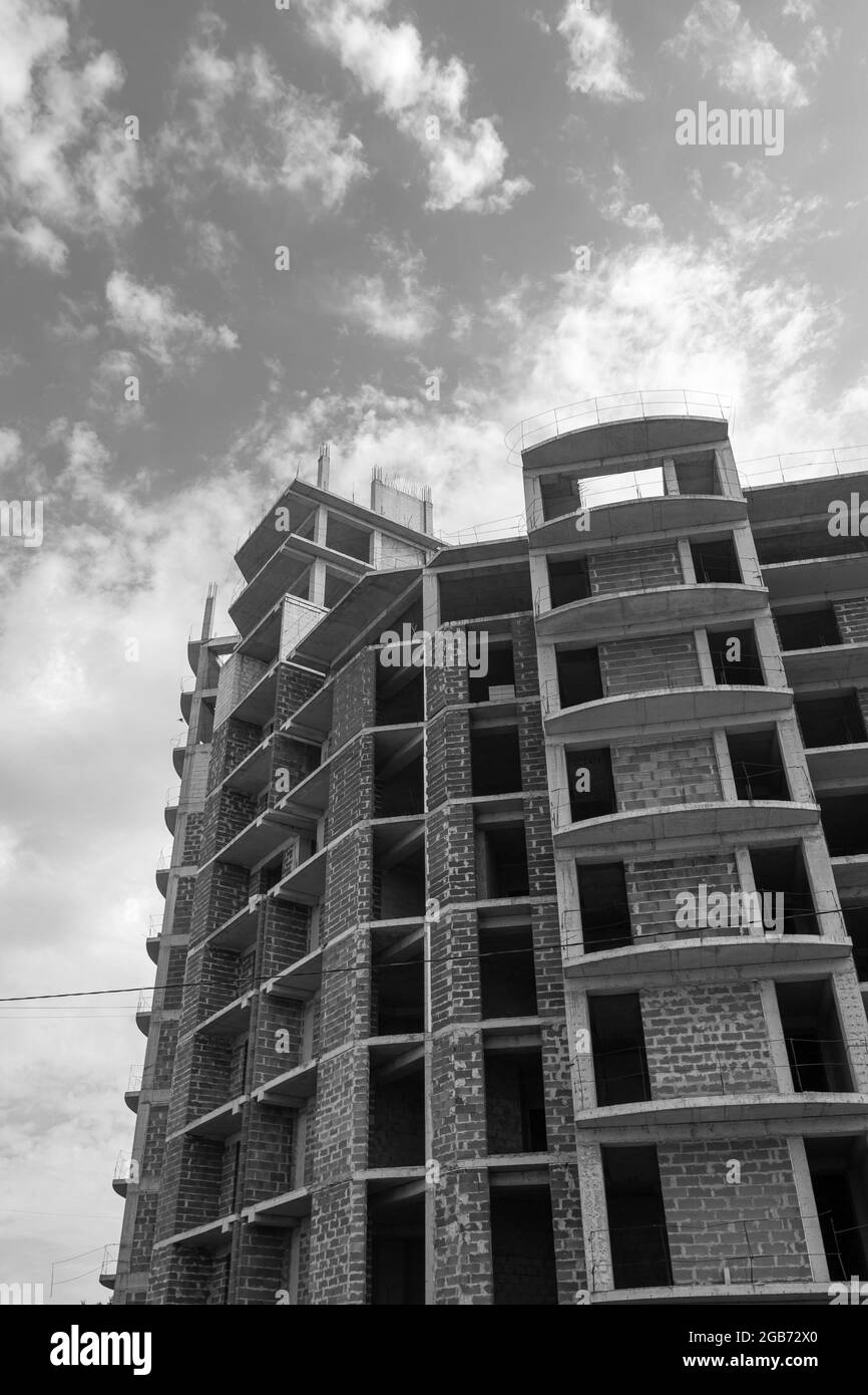 Black and white photo of a multi-storey residential building under ...