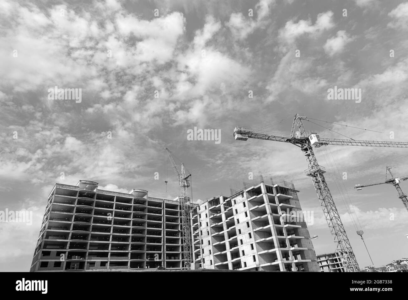 Black and white photo of a multi-storey residential building under ...