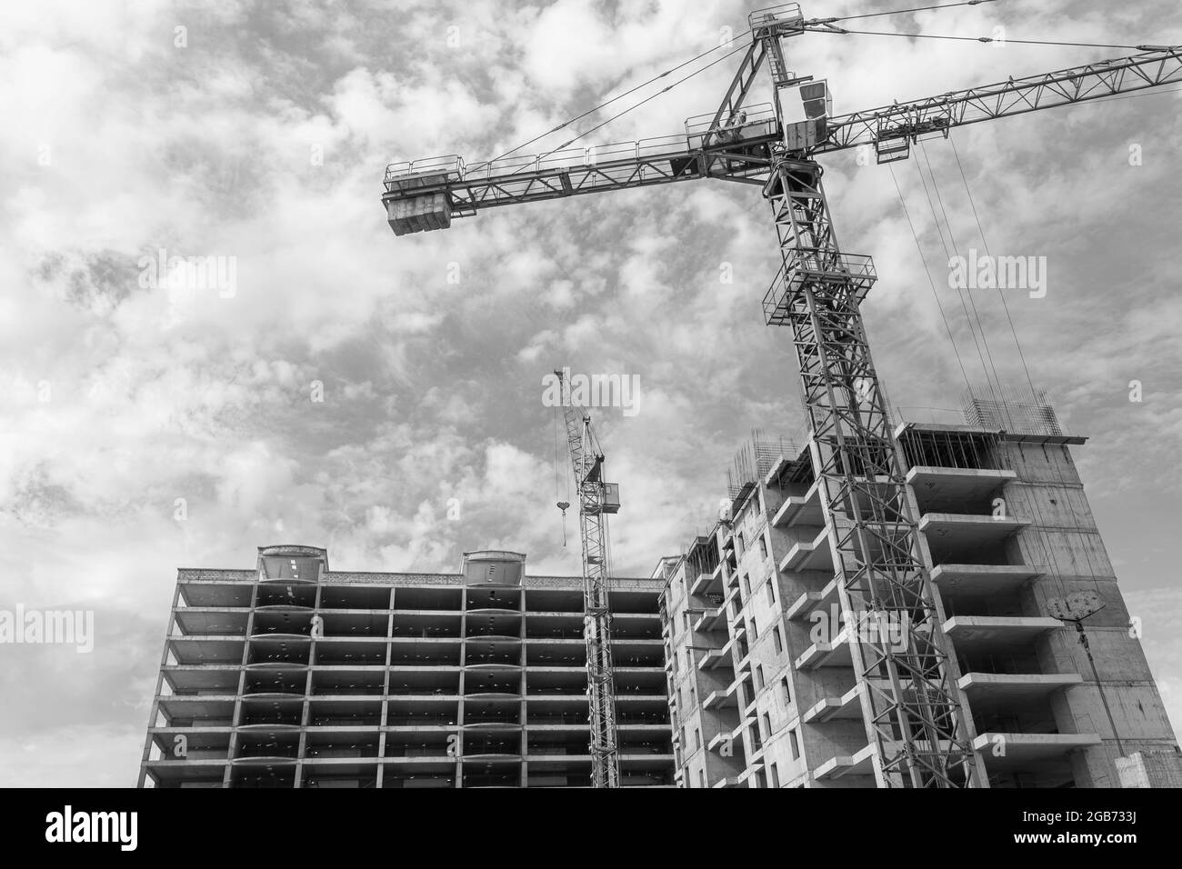 Black and white photo of a multi-storey residential building under ...