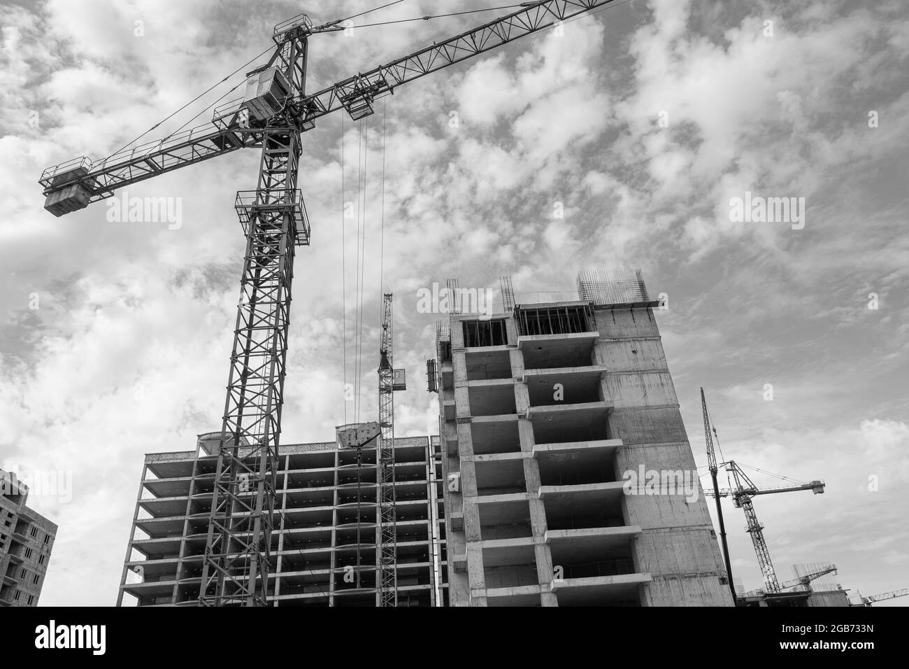 Black and white photo of a multi-storey residential building under ...